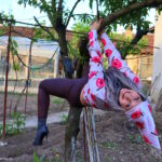 mayfun5-climbing-the-tree-in-highheels